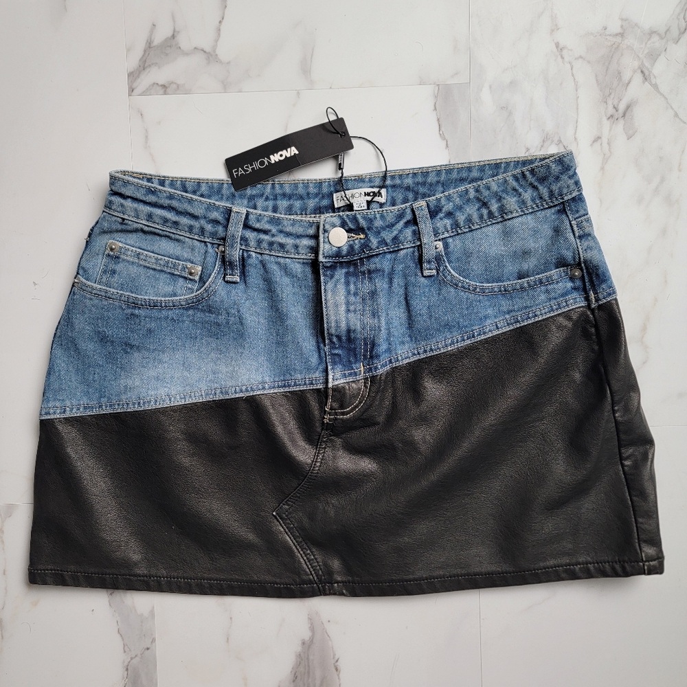 Stylish women’s mini skirt featuring a combination of denim & faux leather